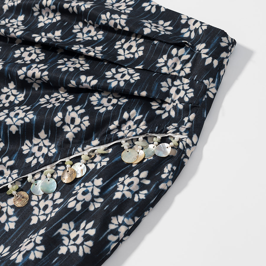 Close-up of fashionable beaded skirts for women with floral pattern and decorative bead detailing