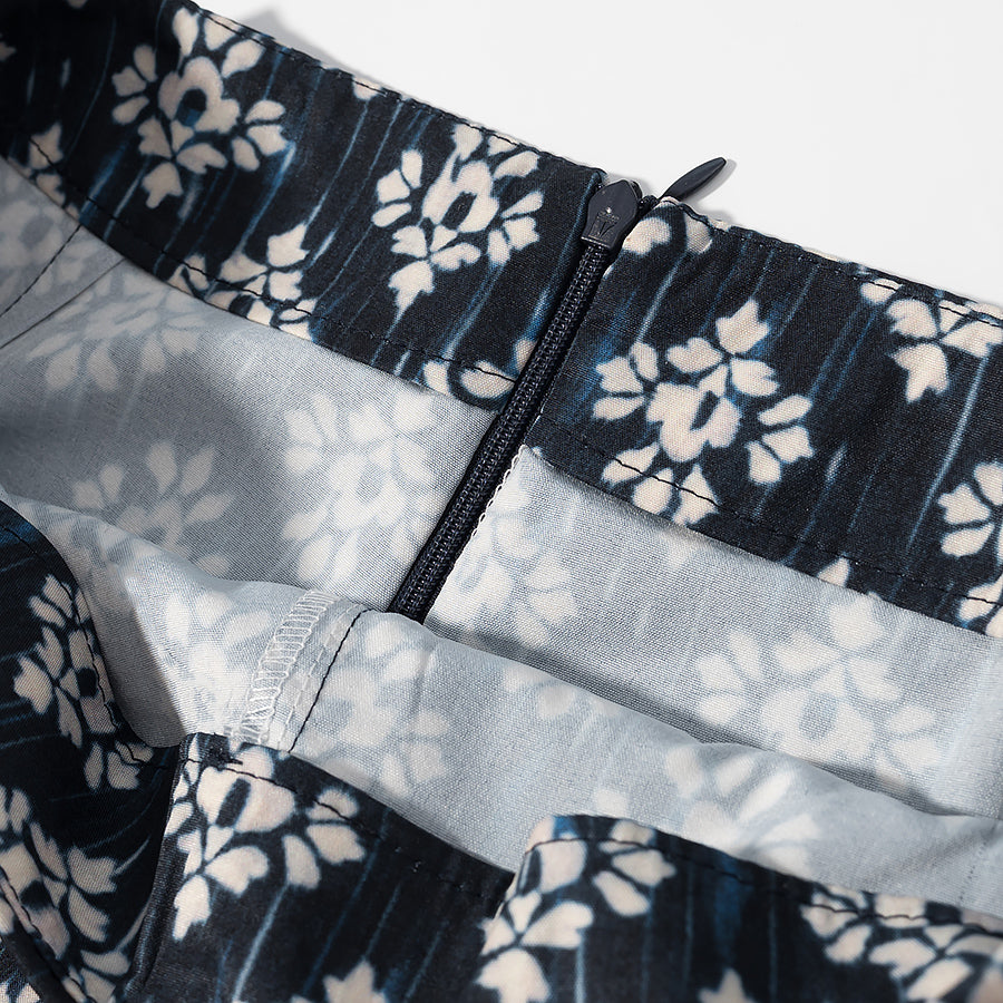 Close-up of zipper and floral pattern on fashionable beaded skirts for women by Malbusaat
