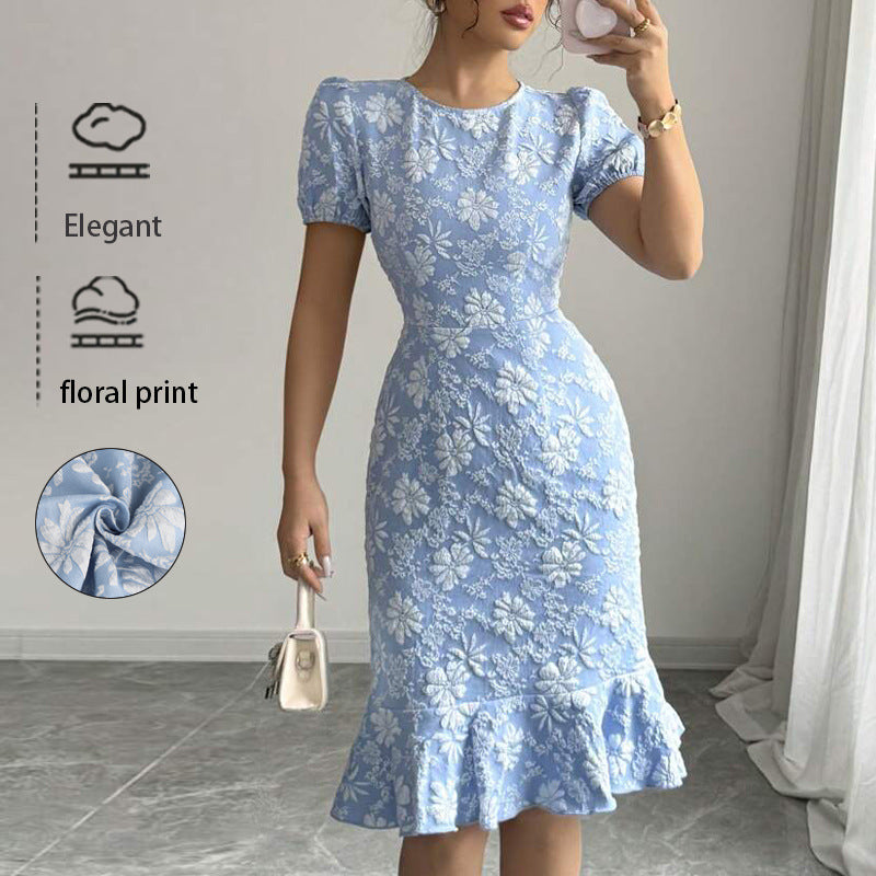 Elegant blue fishtail bodycon dress with white floral print and puff sleeves by Malbusaat