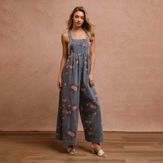 Floral denim jumpsuit for women featuring a relaxed fit and elegant floral patterns