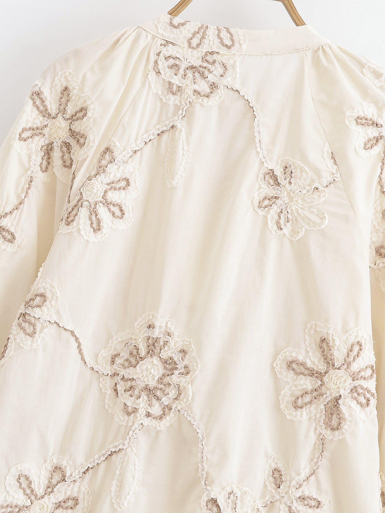 Malbusaat floral mini shirt for women in cream with intricate beige flower embroidery detail