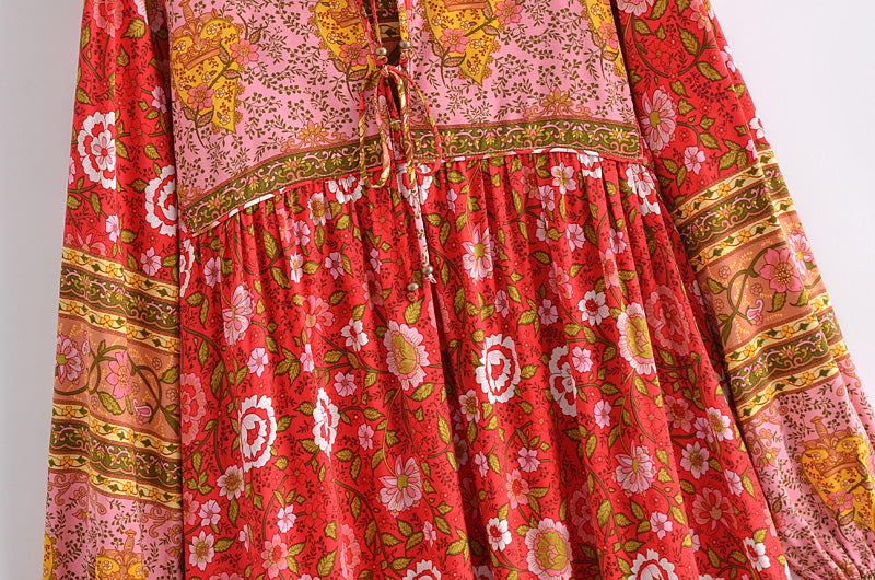 Malbusaat spring long sleeve maxi dress with vibrant floral pattern in red and pink tones