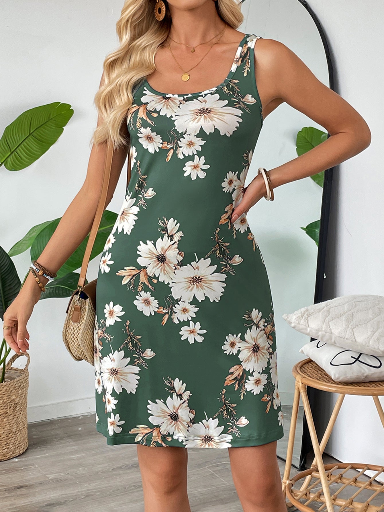 Malbusaat floral spaghetti strap dress in green with white and beige flower print, sleeveless summer style