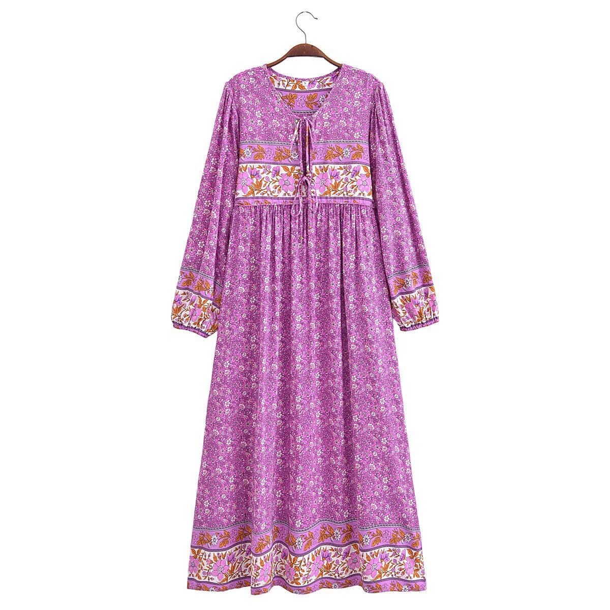 Malbusaat floral tie-neck maxi dress in purple with long sleeves and decorative floral borders