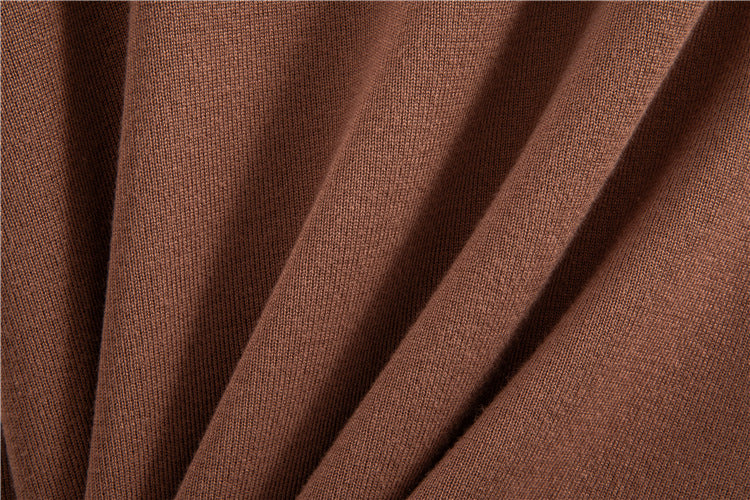 Soft brown fabric drapes of the Janero knit wide leg co ord set showcasing its cozy texture