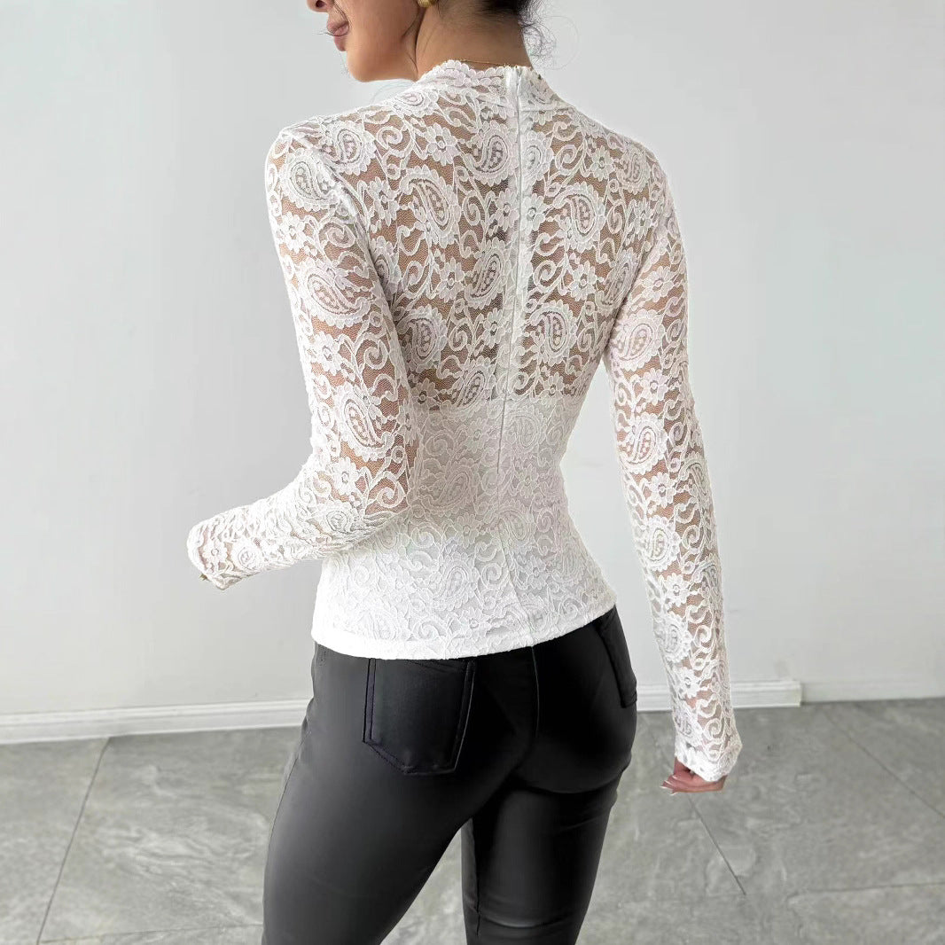 Stylish Malbusaat lace back knit top in white with intricate lace design and long sleeves
