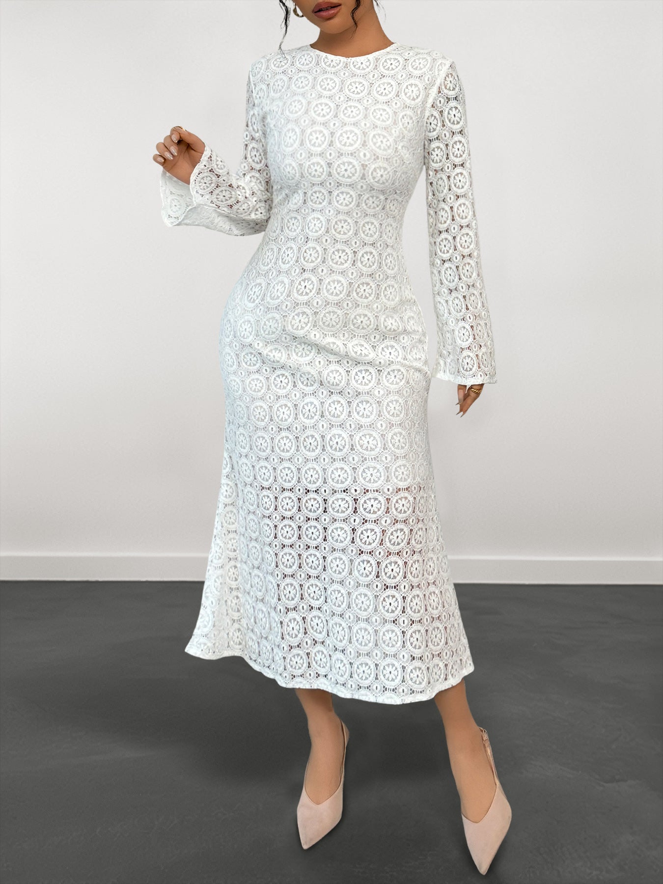 Malbusaat white lace fishtail dress midi length long sleeves round neck floral crochet pattern