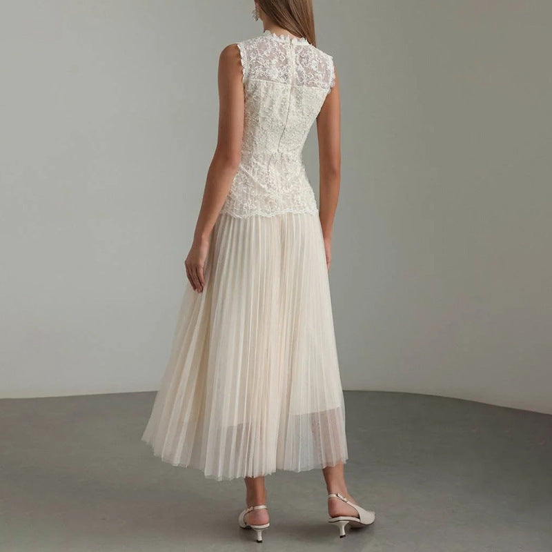 Back view of Lace Mesh Embroidered Sleeveless Maxi dress by Malbusaat with sheer pleated skirt and intricate lace bodice