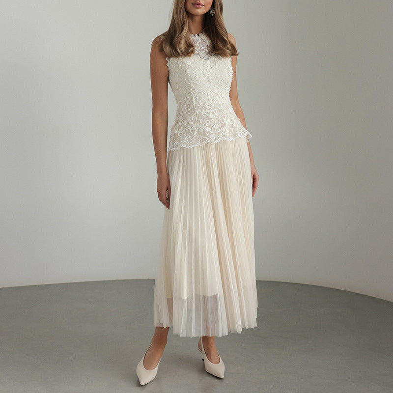 Malbusaat Lace Mesh Embroidered Sleeveless Maxi dress in white with pleated skirt and delicate lace detailing