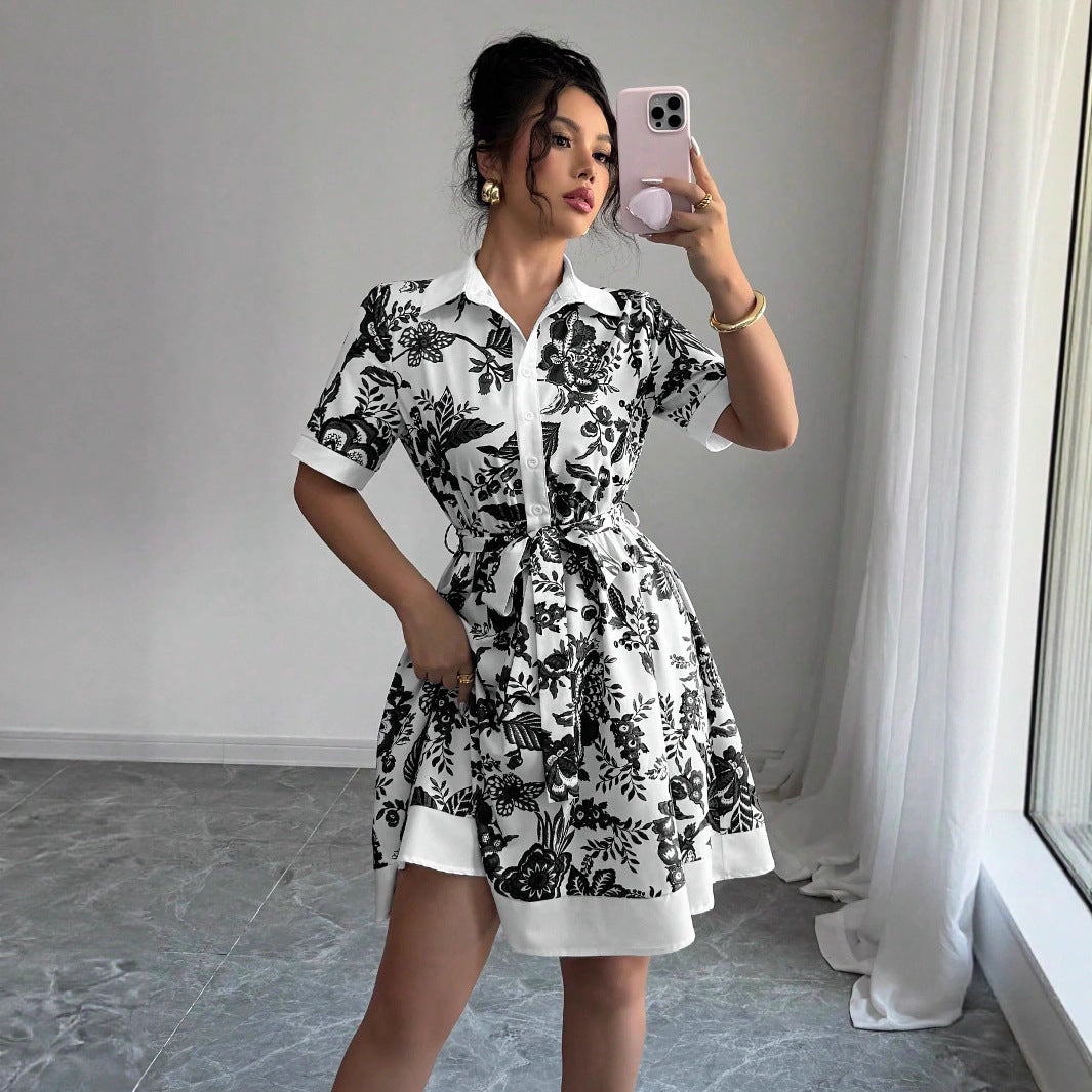 Malbusaat lace up waist midi dress in black and white floral pattern with short sleeves and collar