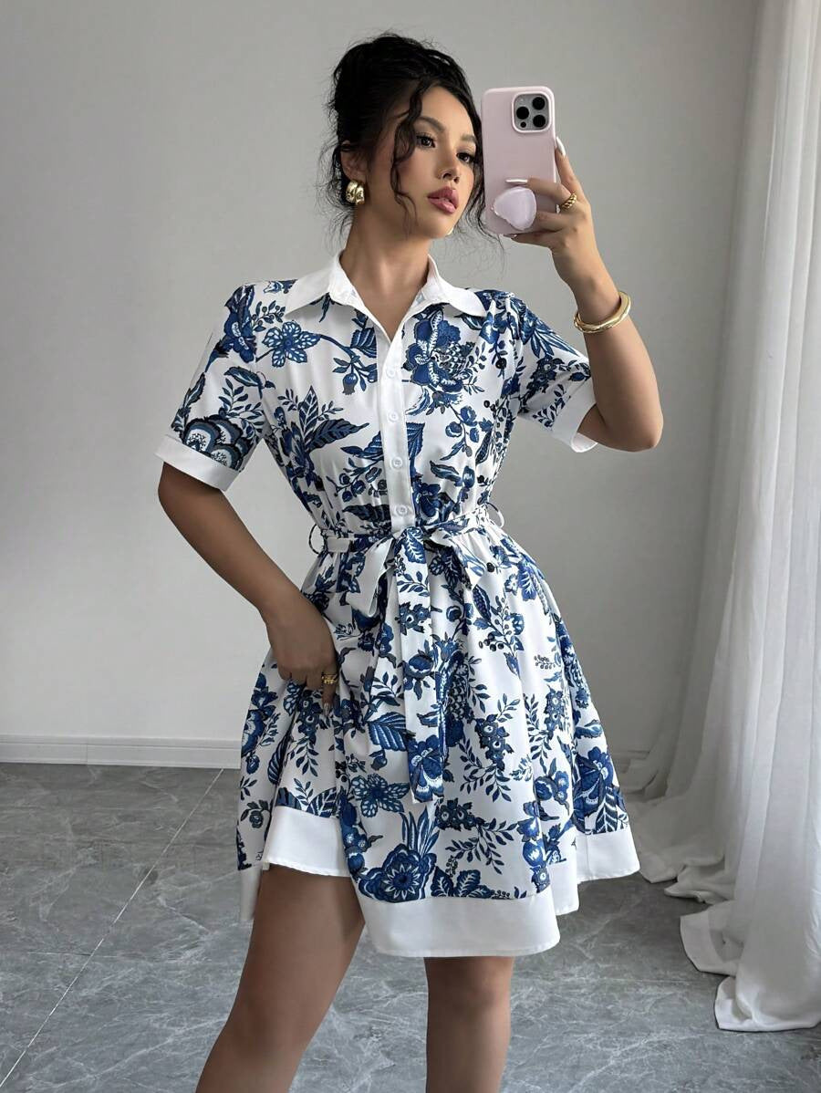 Malbusaat lace up waist midi dress in white with blue floral print and A line silhouette