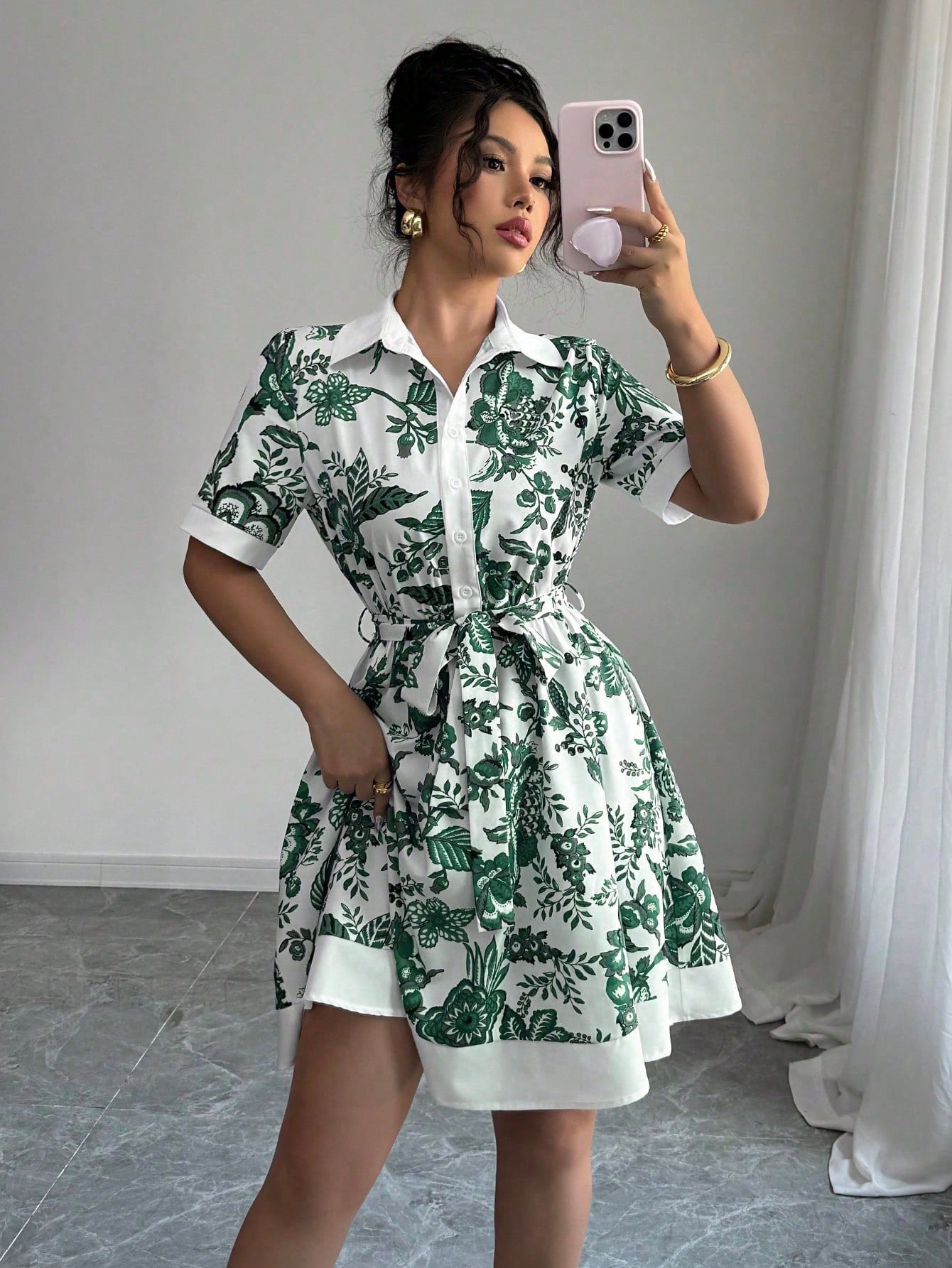 Malbusaat lace up waist midi dress with green floral print and A line silhouette