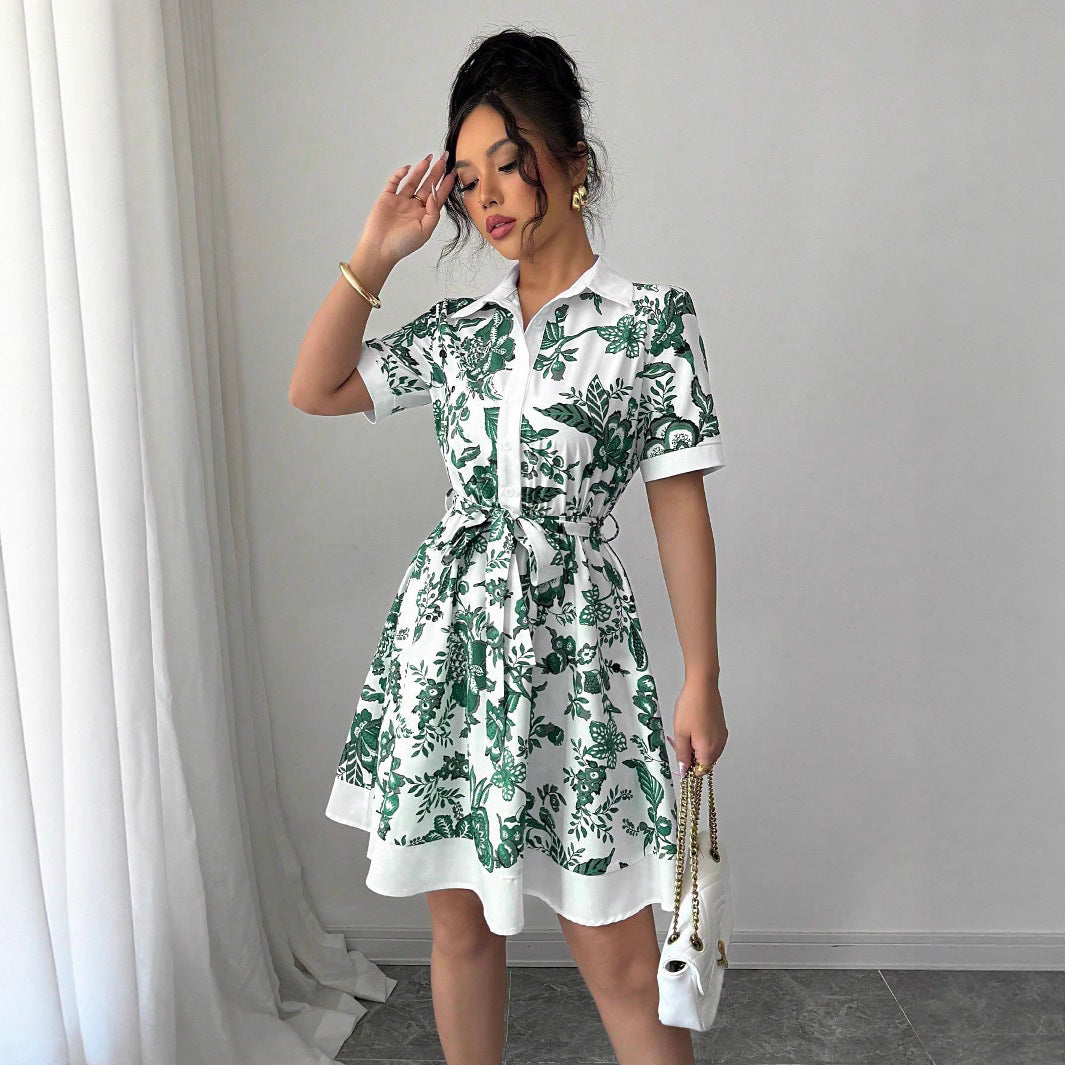 Malbusaat A line lace up waist midi dress with green floral print and white collar worn by model