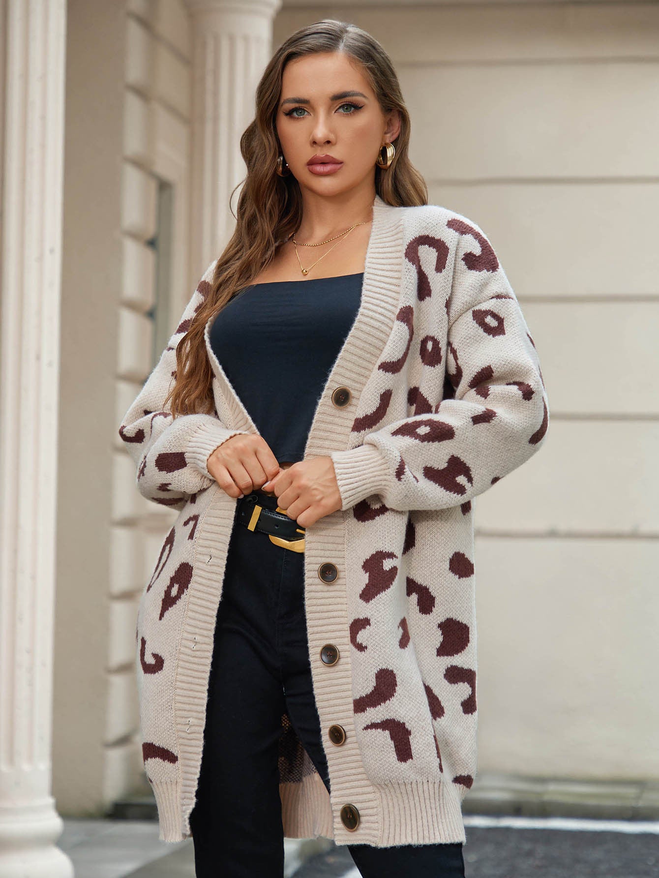 Stylish Malbusaat leopard knit cardigan in beige with brown spots, perfect for casual outfits