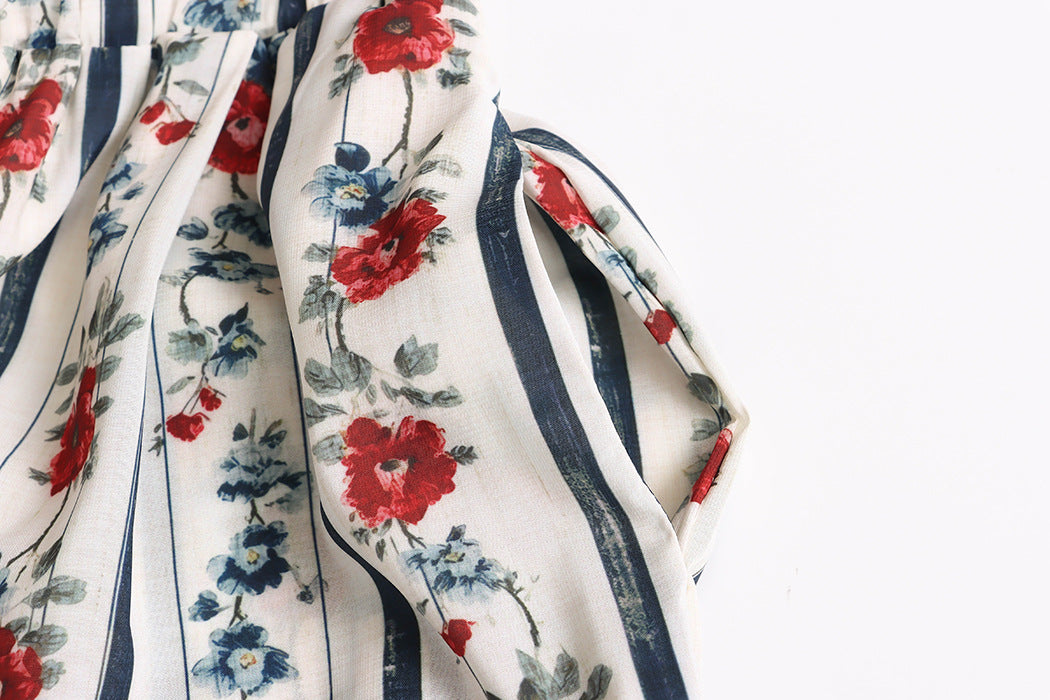 Floral and navy stripe cotton close up with pocket detail on Malbusaat loose straight wide pants for women