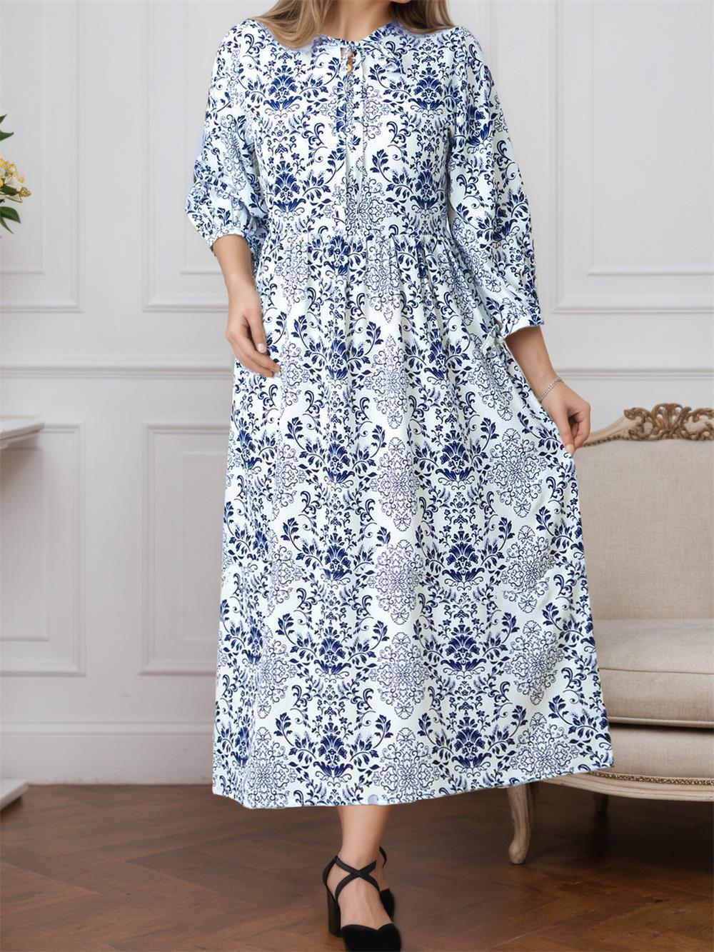 Malbusaat printed lace up maxi dress in white and blue floral pattern, perfect for summer outings