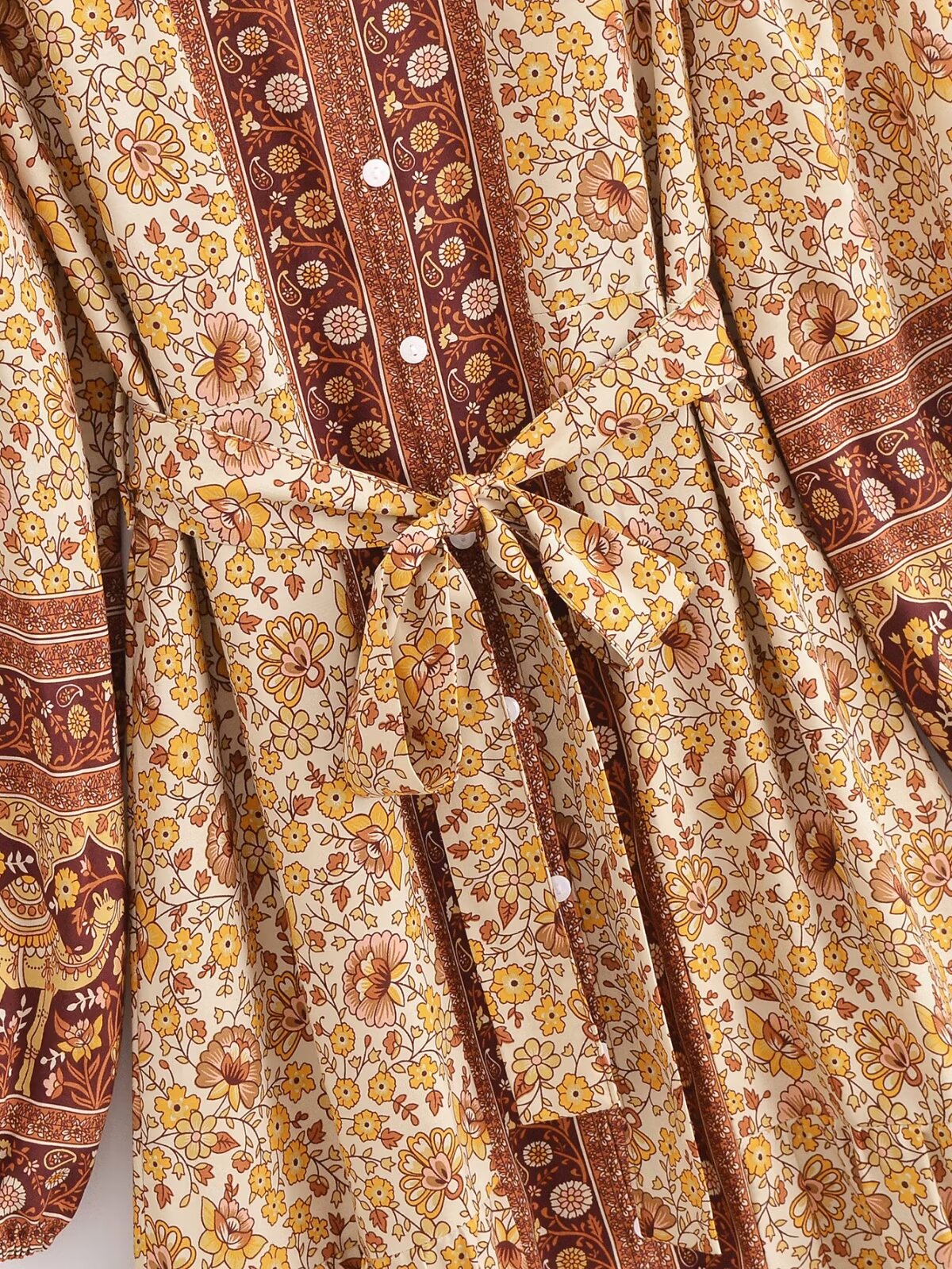 Malbusaat printed rayon maxi dress for women featuring floral patterns and a tied waist belt