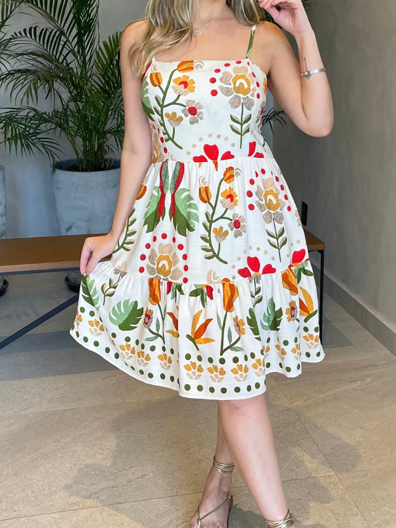 Malbusaat printed strap tiered dress with vibrant floral design for summer style
