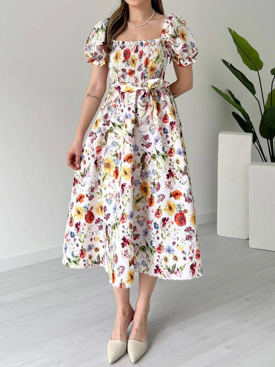 PLAYA puff sleeve floral midi dress with a fitted bodice and flowing skirt, perfect for summer outings