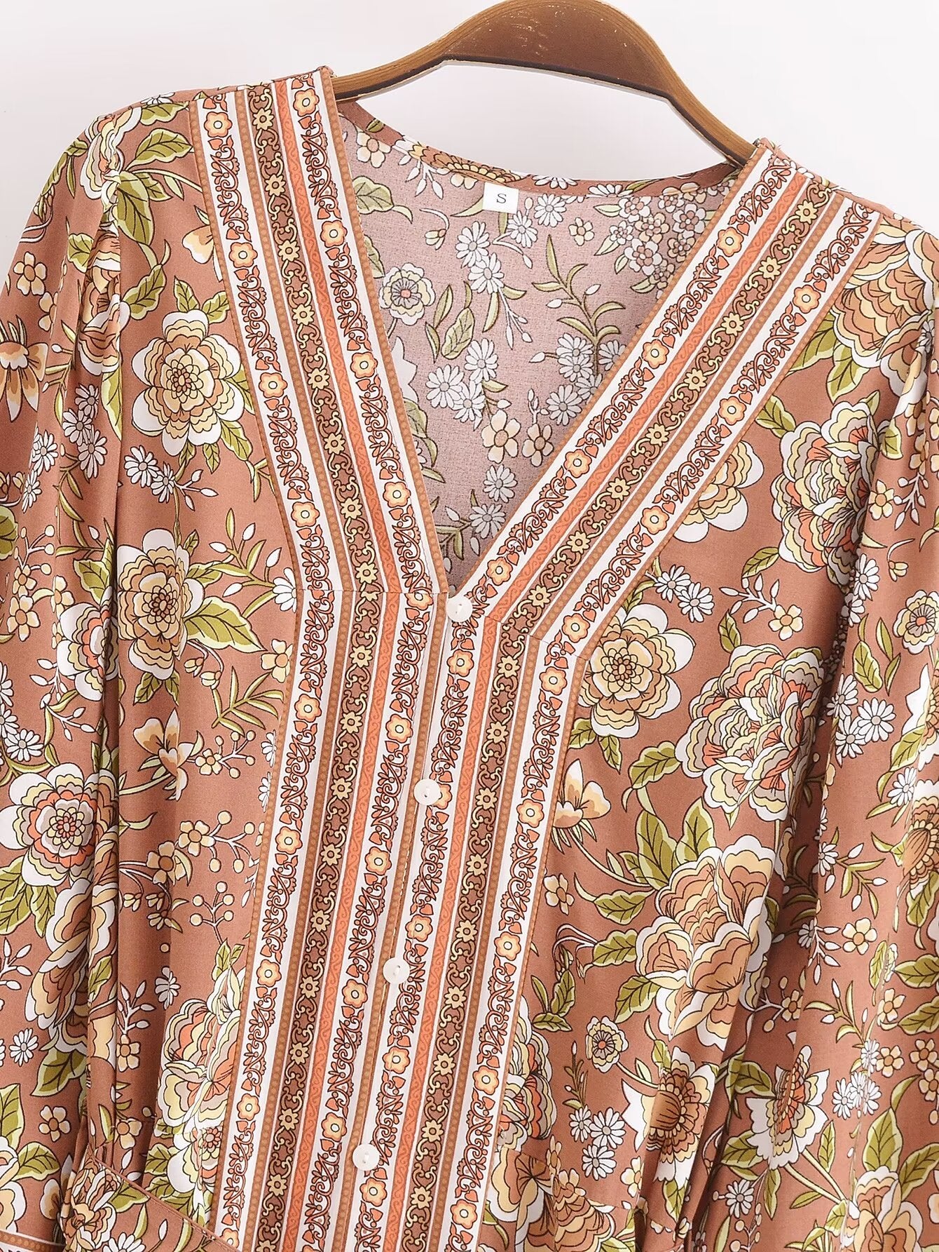 Malbusaat rayon printed long sleeve dress with floral patterns and button-down front design