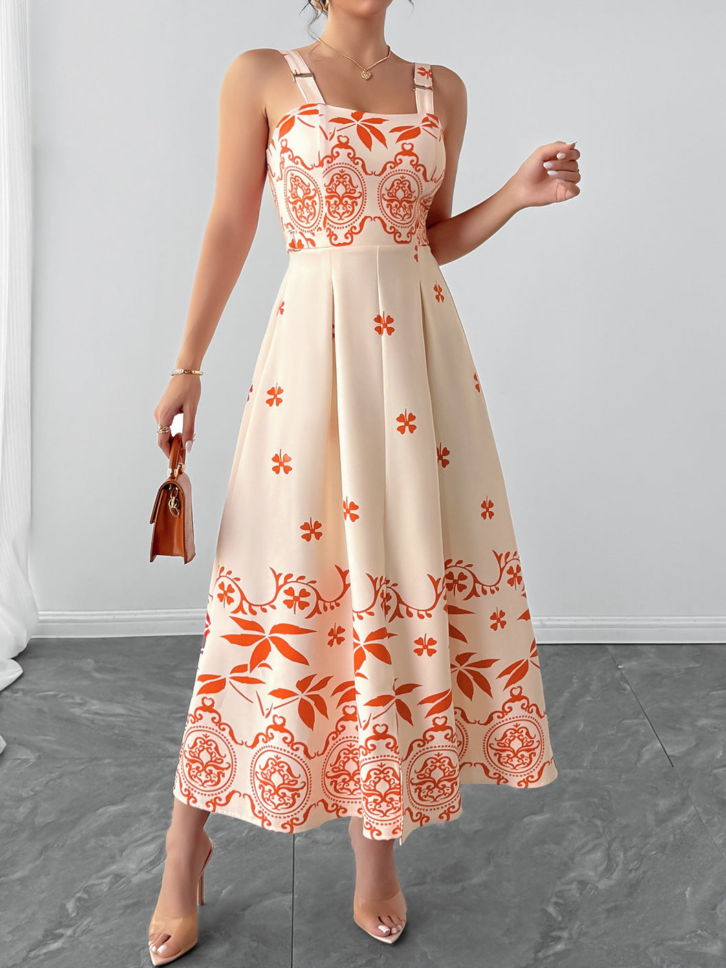 PLAYA retro waist maxi dress in cream with orange floral print, perfect for summer outings