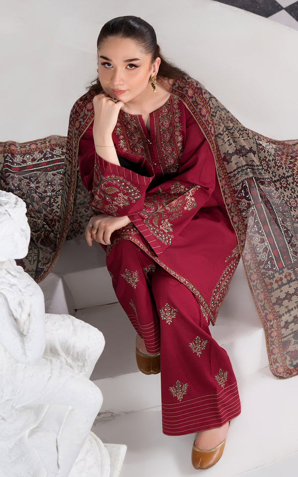 Rich Maroon Embroidered Viscose Suit by Malbusaat with intricate detailing and elegant design