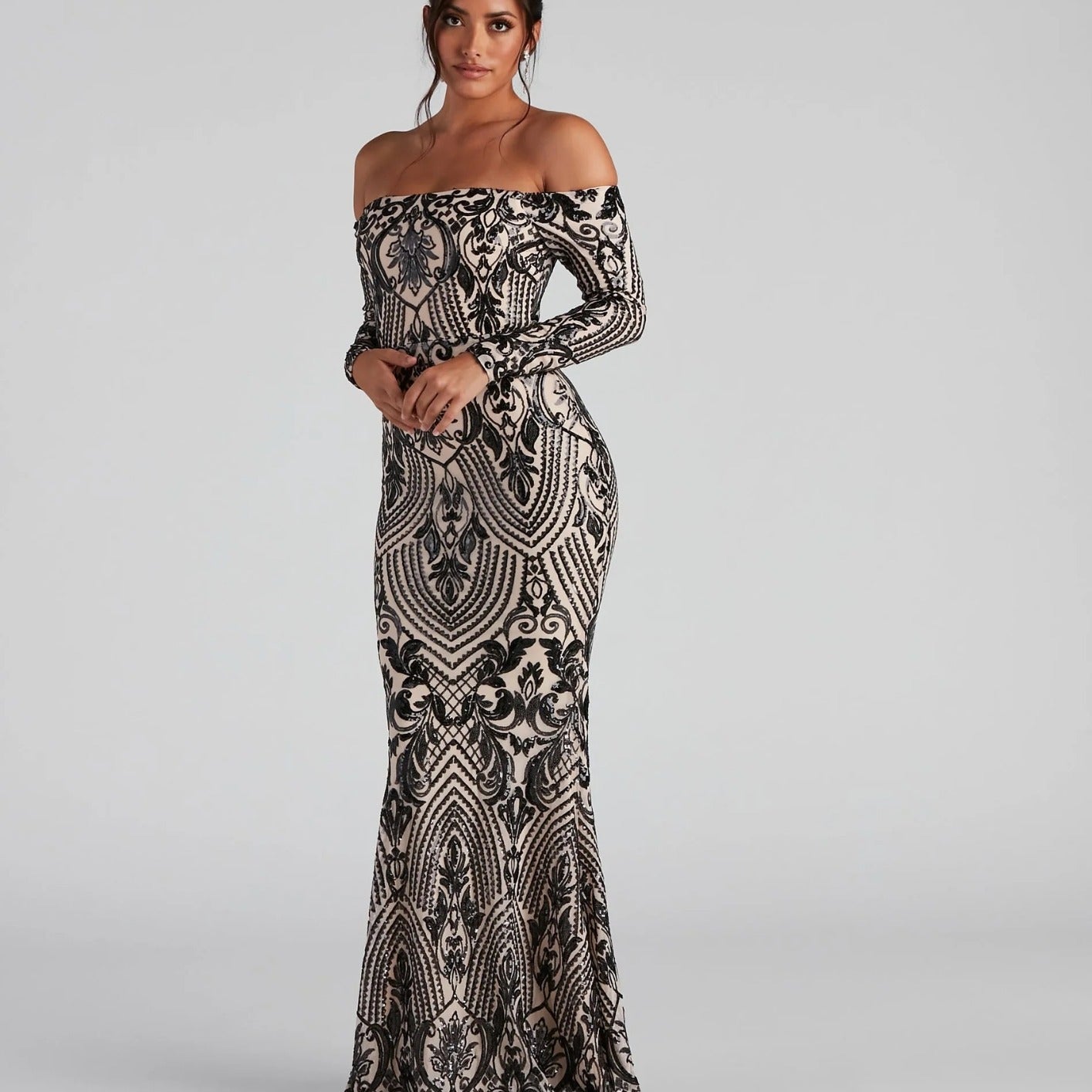 Elegant Malbusaat sequin off shoulder maxi dress featuring intricate patterns and a flattering silhouette