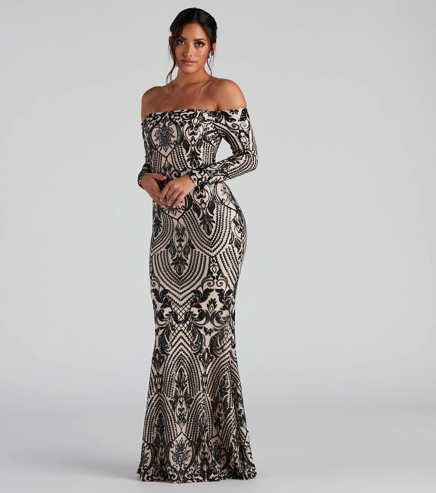 Elegant sequin off shoulder maxi dress by Malbusaat with a flattering fit and intricate pattern