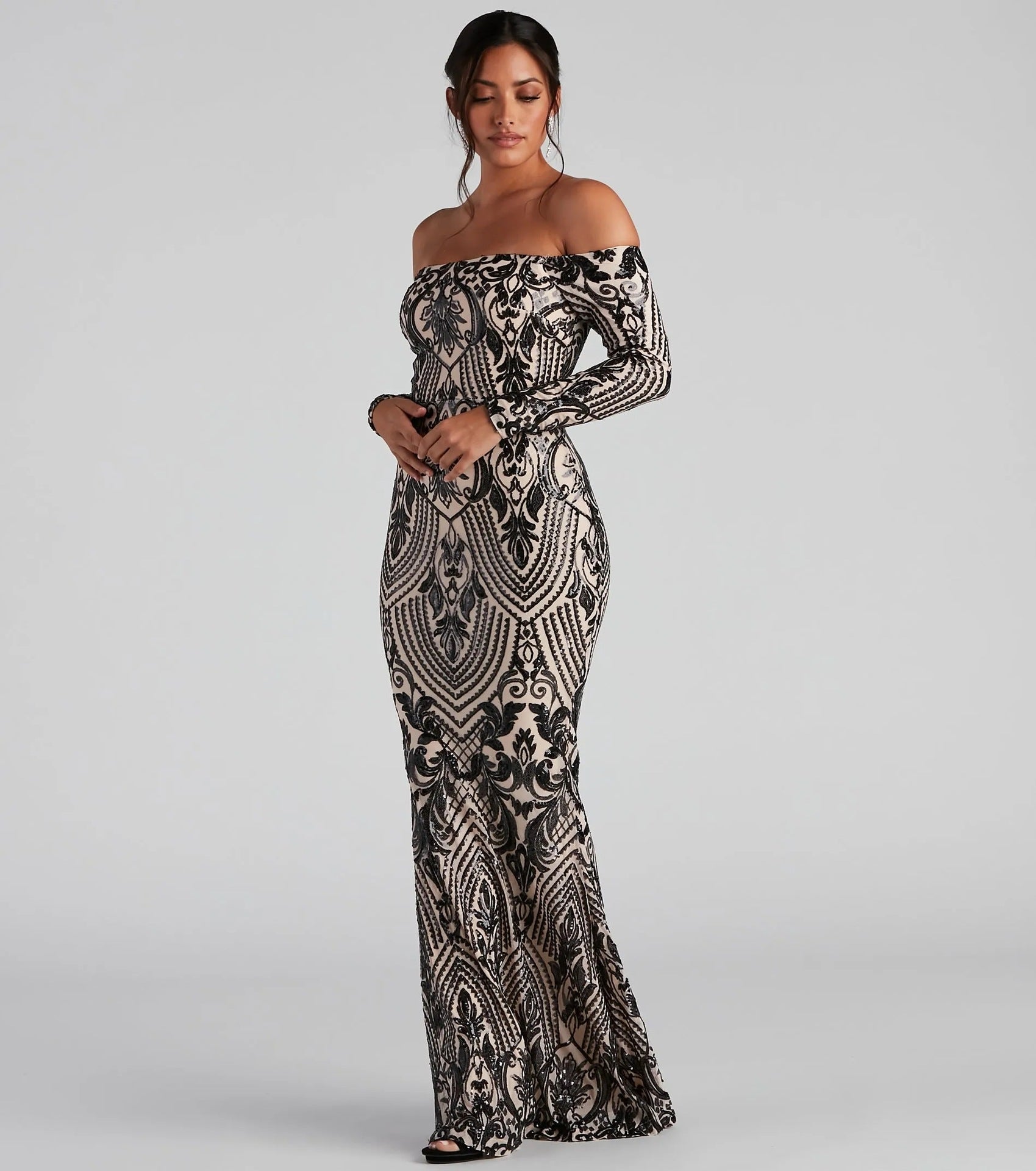 Elegant Malbusaat sequin off shoulder maxi dress in black and gold design for special occasions
