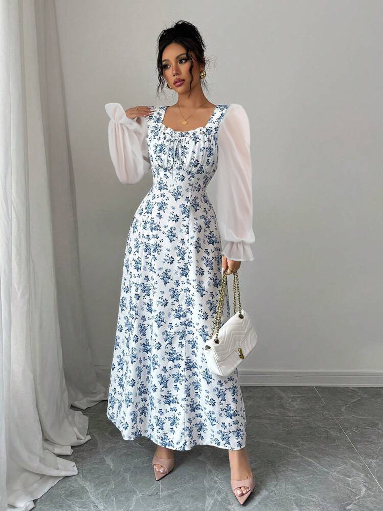 Malbusaat square neck swing dress in floral print with puff sleeves, perfect for summer occasions