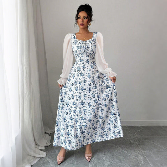 Elegant Malbusaat square neck swing dress with floral pattern and puffed sleeves, perfect for special occasions