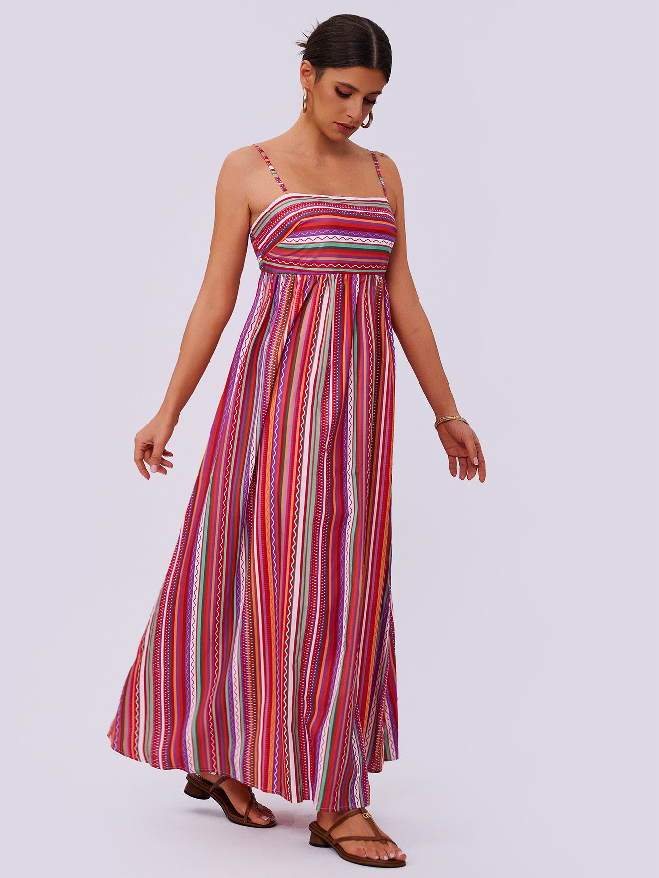 striped strap tube top dress with colorful vertical stripes and a flowing A-line skirt
