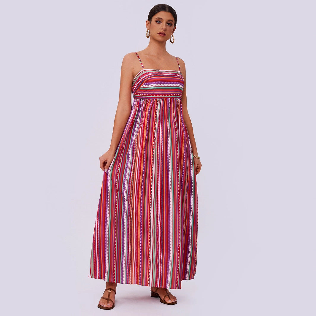 Woman wearing a striped strap tube top dress with a colourful A line silhouette