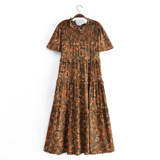 Malbusaat summer printed midi dress with brown floral pattern and short sleeves on hanger