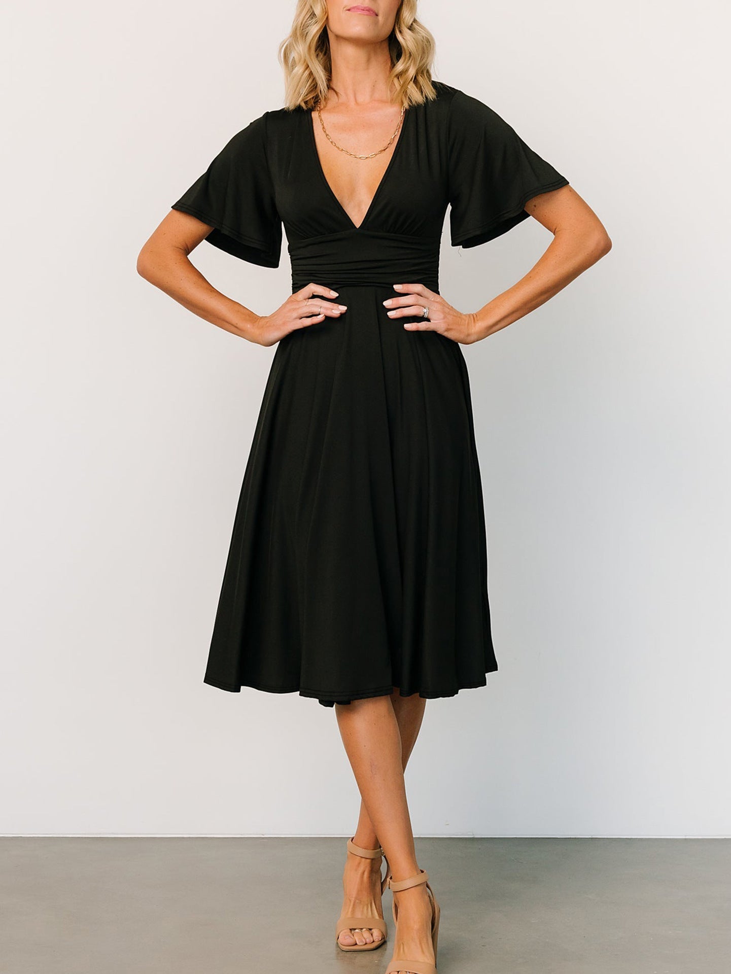 Malbusaat black summer V neck dress for women with flutter sleeves and knee-length flowy skirt