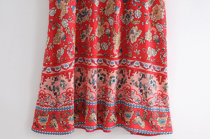 Malbusaat long sleeve floral dress for women featuring red fabric with intricate floral and patterned design
