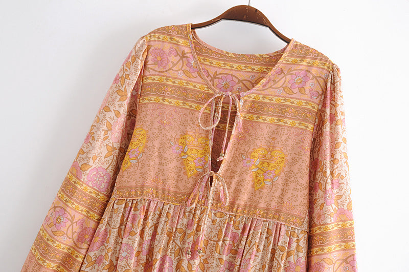 Malbusaat long sleeve rayon tassel dress in soft pink with floral and geometric patterns