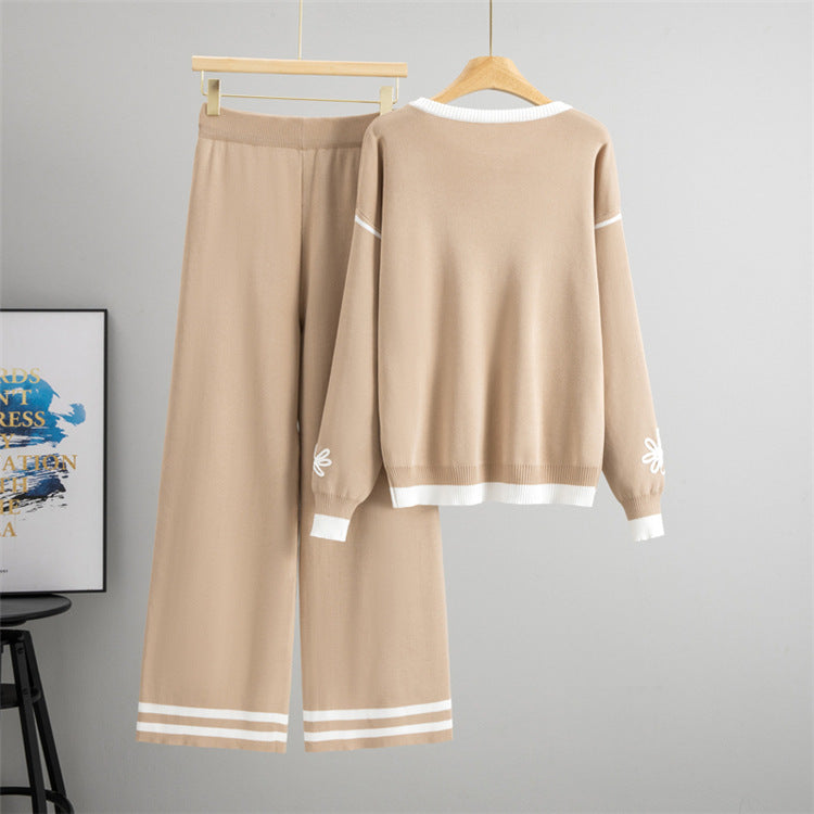 Beige loose knit two piece set for women featuring a top and matching wide-leg trousers