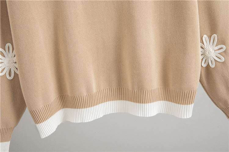 Loose knit two piece set for women in beige with floral embroidery details on the sweater