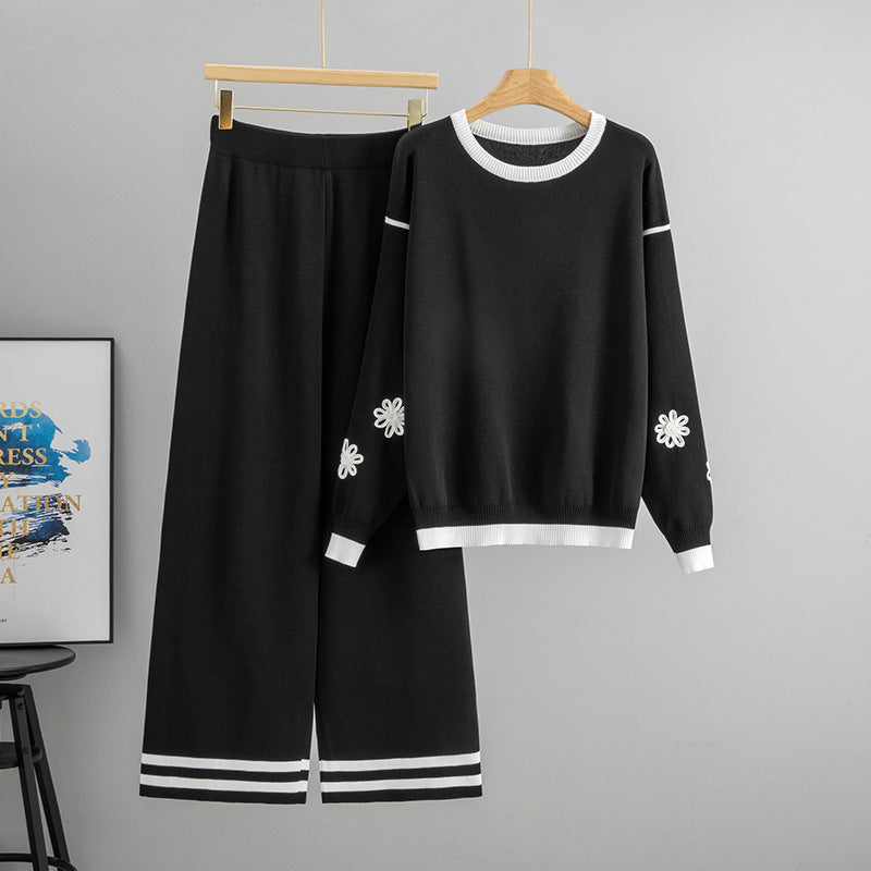 Malbusaat loose knit two piece set for women in black with white accents and floral details