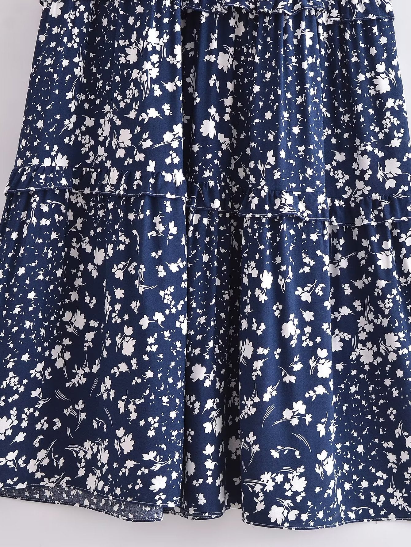 Malbusaat women's summer floral dress with navy blue fabric and white floral print detailing