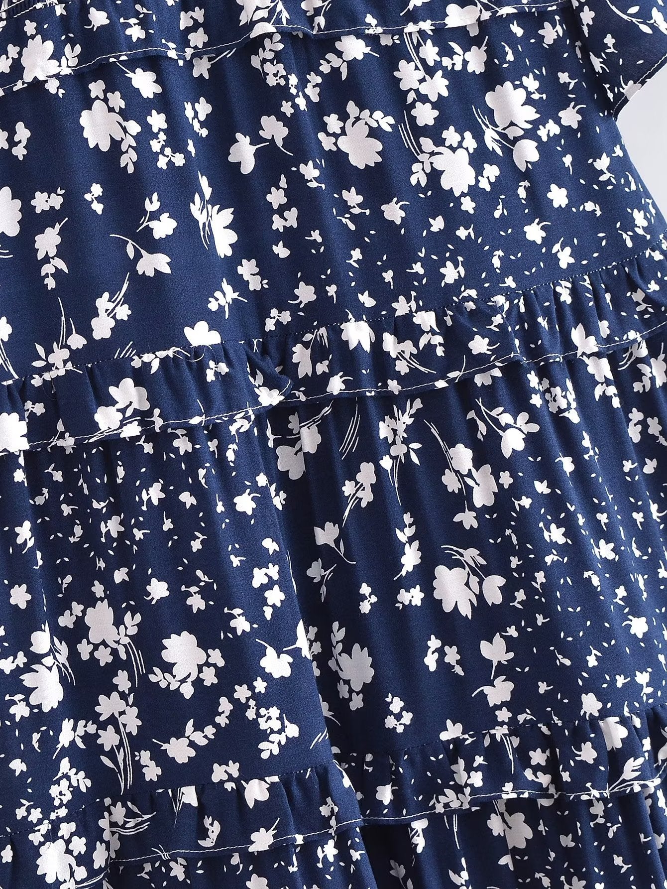 Malbusaat women's summer floral dress in navy blue with white flower patterns and ruffled layers