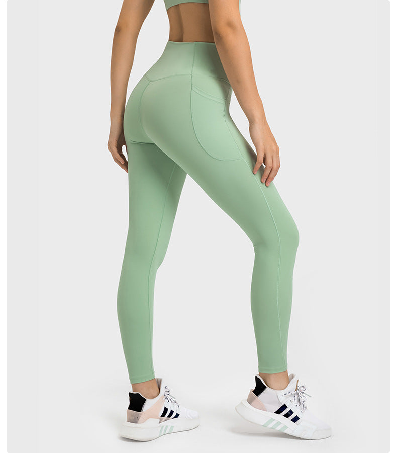 Cross Waist Sports Fitness Tights in - by Malbusaat