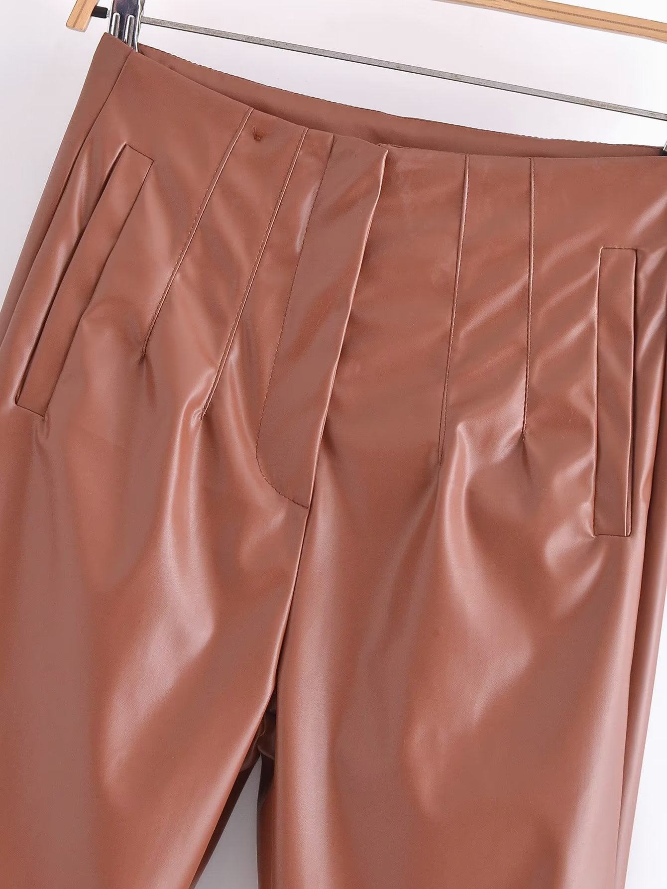 High Waist Faux Leather Pants in - by Malbusaat