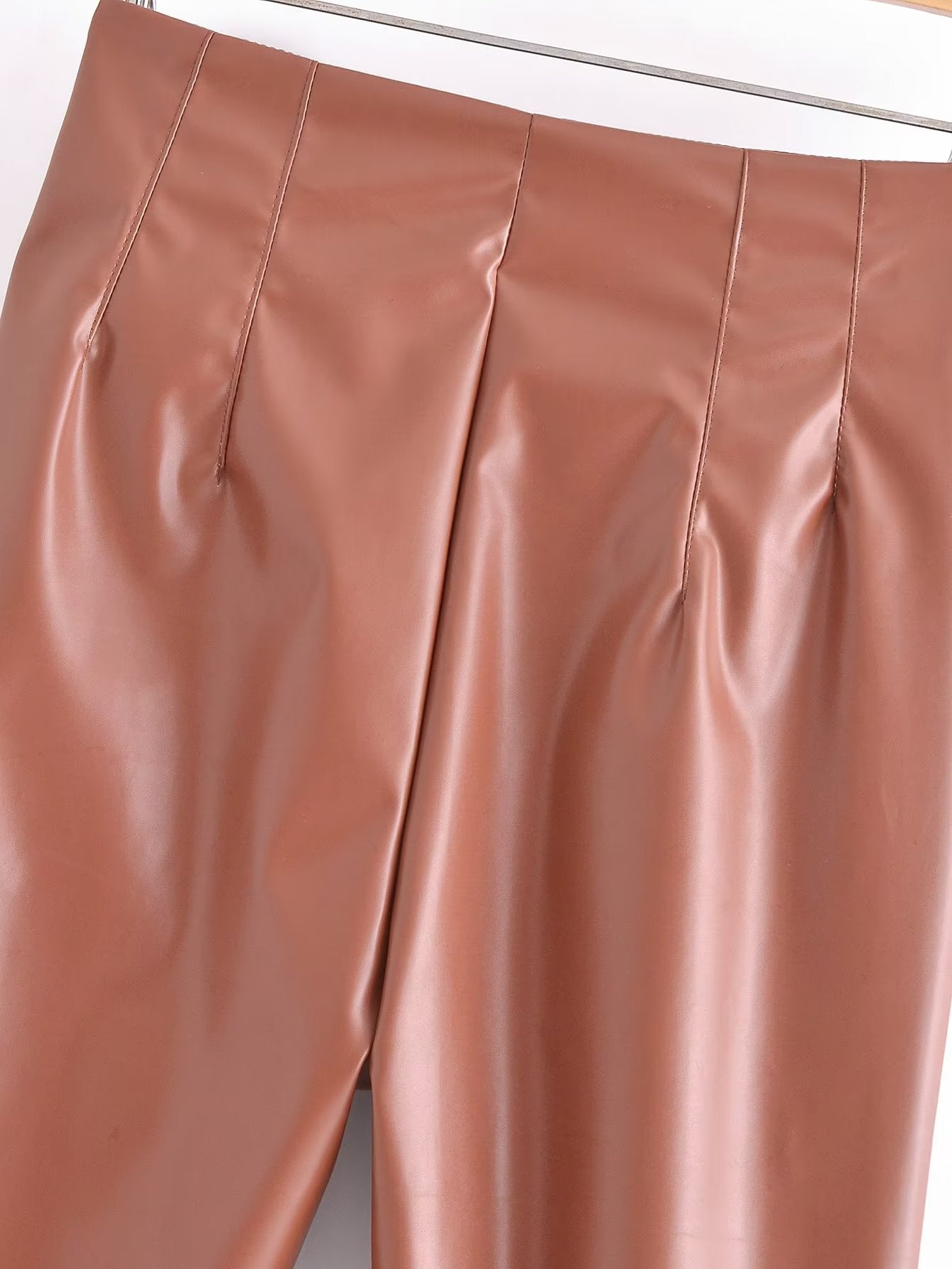 High Waist Faux Leather Pants in - by Malbusaat