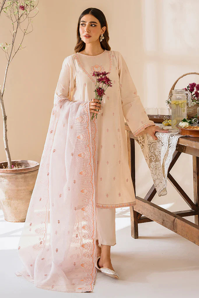 Photo of Women Wearing Pakistani Ready To Wear Dress Outfit and holding Rose. Shop now at Malbusaat for Pakistani Fashion dresses uk online with free delivery.