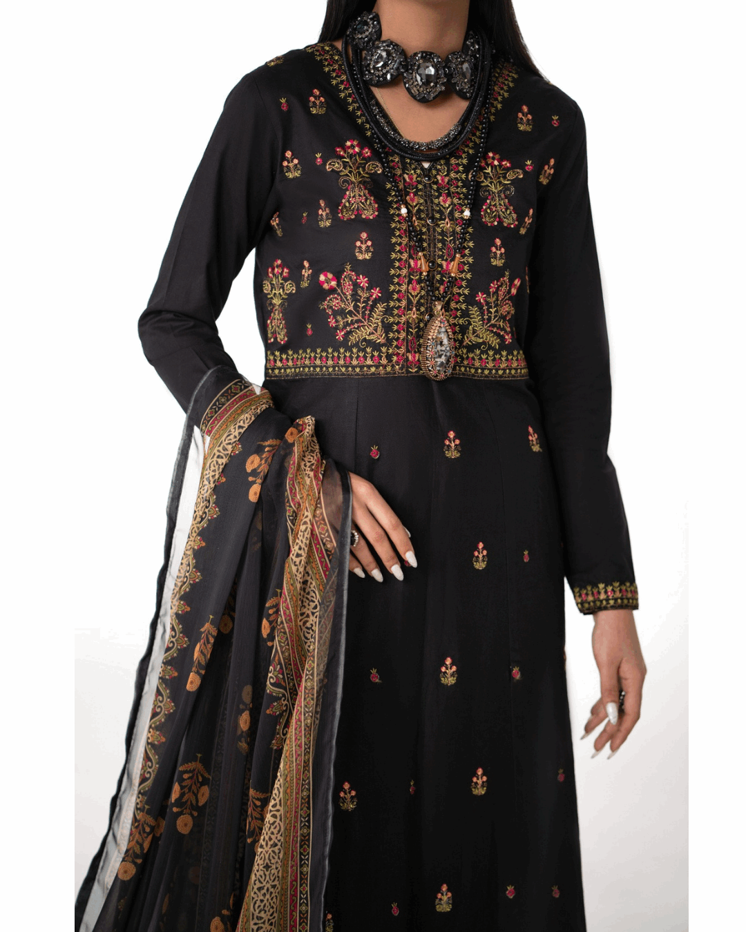 Shop Elegant Black Traditional Suit with Floral Detailing by Malbusaat, versatile Pakistani Dresses at Malbusaat. Ready-made desi suits, Pakistani designer dresses online UK.