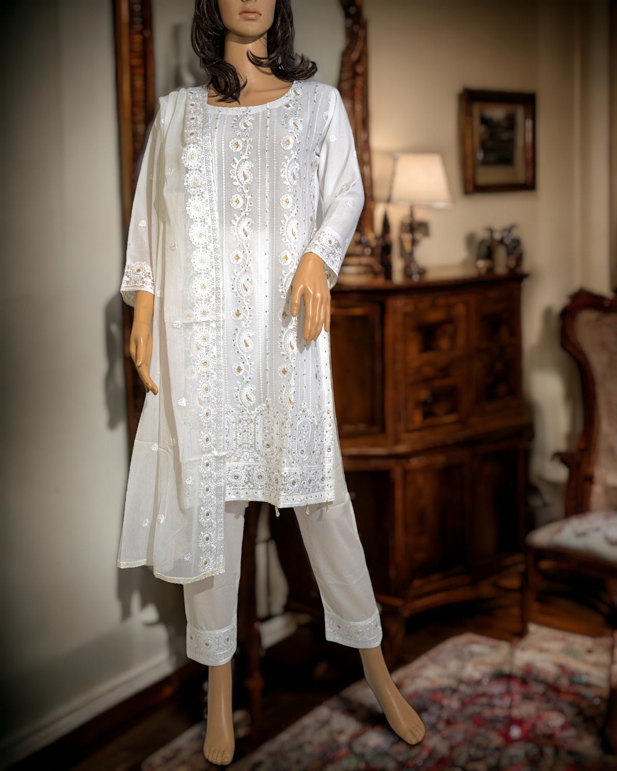 Shop Elegant White Semi-Formal Dress by Malbusaat, versatile Pakistani Dress at Malbusaat. Ready-made desi suits, Pakistani designer dresses online UK.