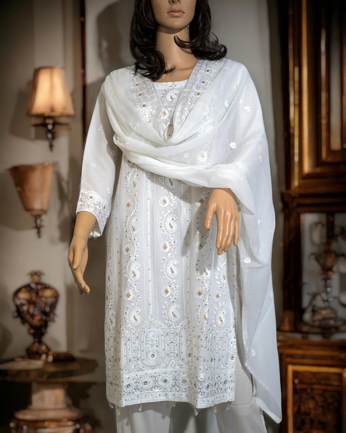 Shop Elegant White Semi-Formal Dress by Malbusaat, versatile Pakistani Dress at Malbusaat. Ready-made desi suits, Pakistani designer dresses online UK.