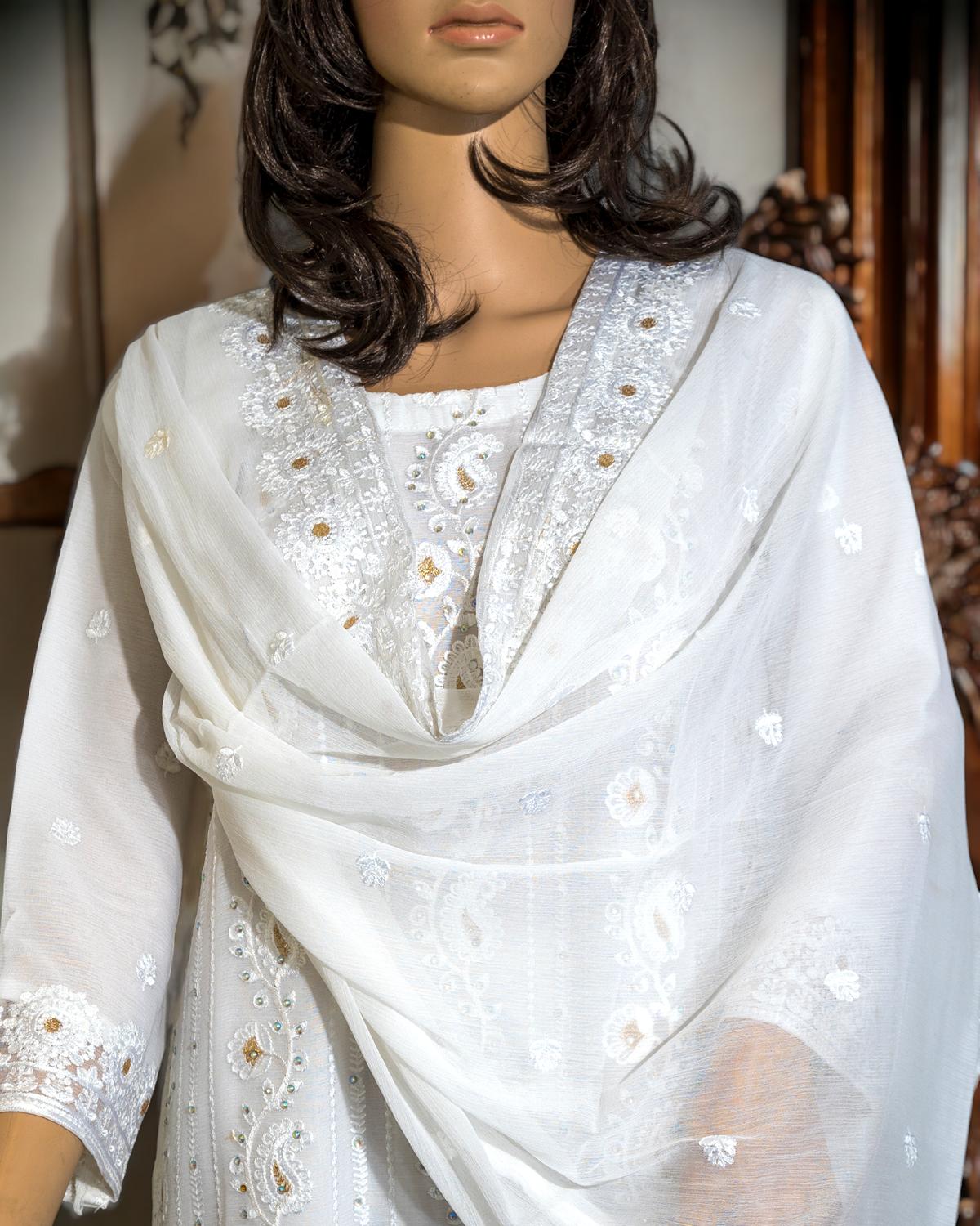 Shop Elegant White Semi-Formal Dress by Malbusaat, versatile Pakistani Dress at Malbusaat. Ready-made desi suits, Pakistani designer dresses online UK.